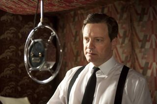 colin firth as King George VI about to talk into a microphone in the king's speech