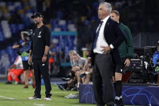 Liverpool manager Jurgen Klopp, left, watches on as his side lost in Italy