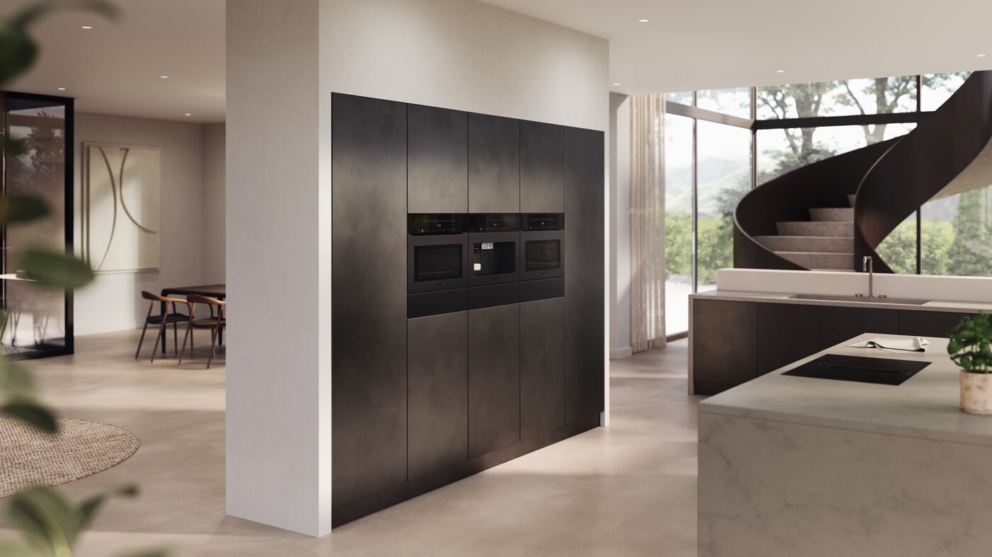 Open plan kitchen living room with Miele appliances built into cabinetry