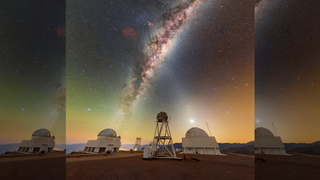 Photograph taken of the night sky showing the Milky Way and zodiacal light crisscross above the Cerro Tololo Inter-American Observatory in Chile.