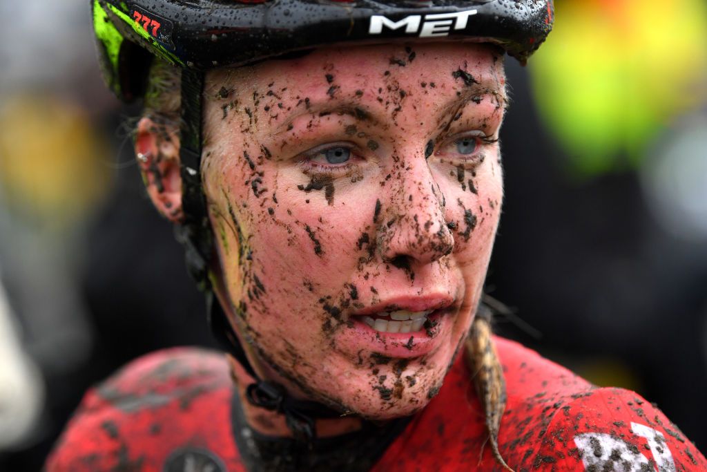 BOOM BELGIUM DECEMBER 04 Annemarie Worst of The Netherland and Team 777 catching breath covered in mud after the 7th Superprestige Cyclocross Boom 2021 Womens Elite SPBoom Superprestige2022 on December 04 2021 in Boom Belgium Photo by Luc ClaessenGetty Images