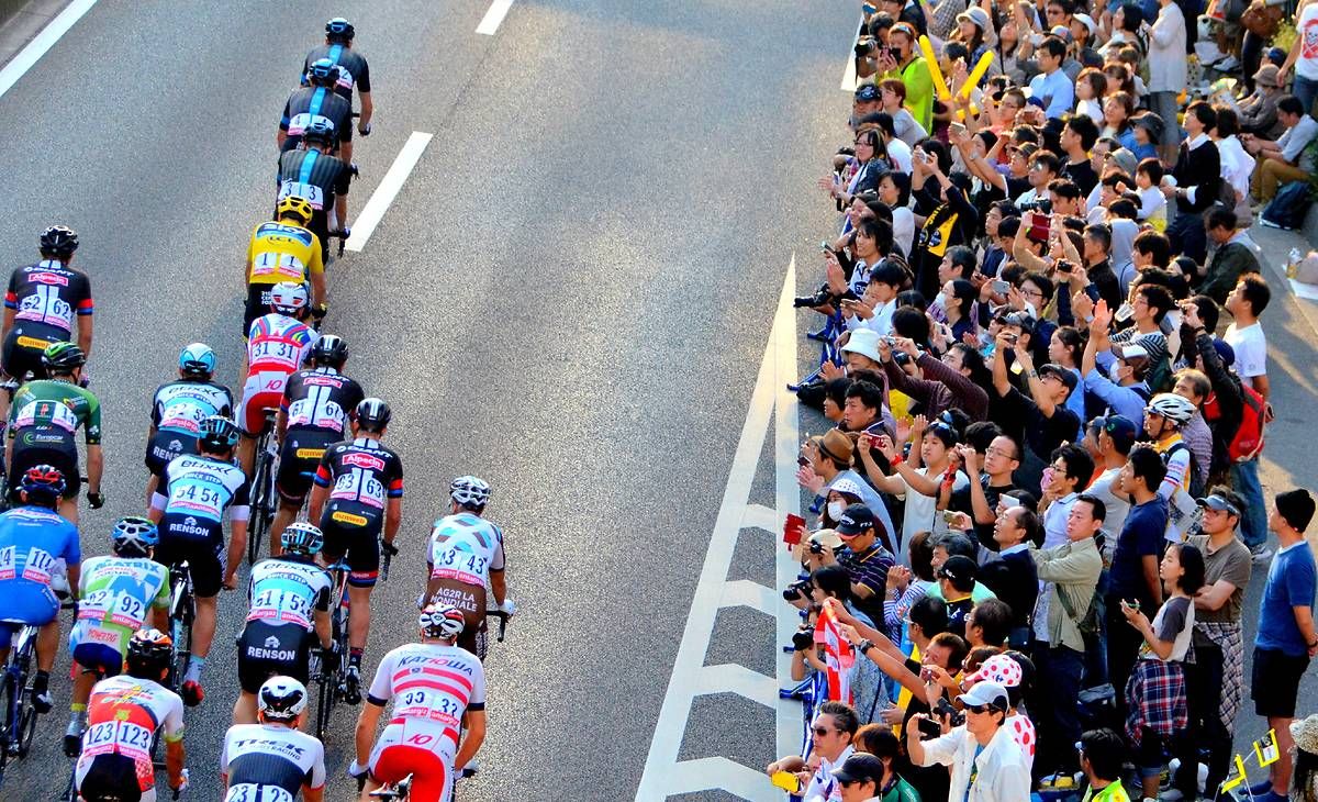 The Japanese crowds watch on Team Sky controlled the peloton