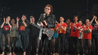 Tony Iommi bows at the curtain call during the press night performance of "Black Sabbath – The Ballet" at Sadler's Wells Theatre on October 18, 2023 in London, England