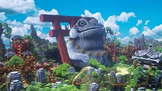 Minecraft builds - a gigantic frog statue rules over the surrounding cityscape in Minecraft
