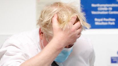 Boris Johnson during a visit to a vaccination centre in Northampton