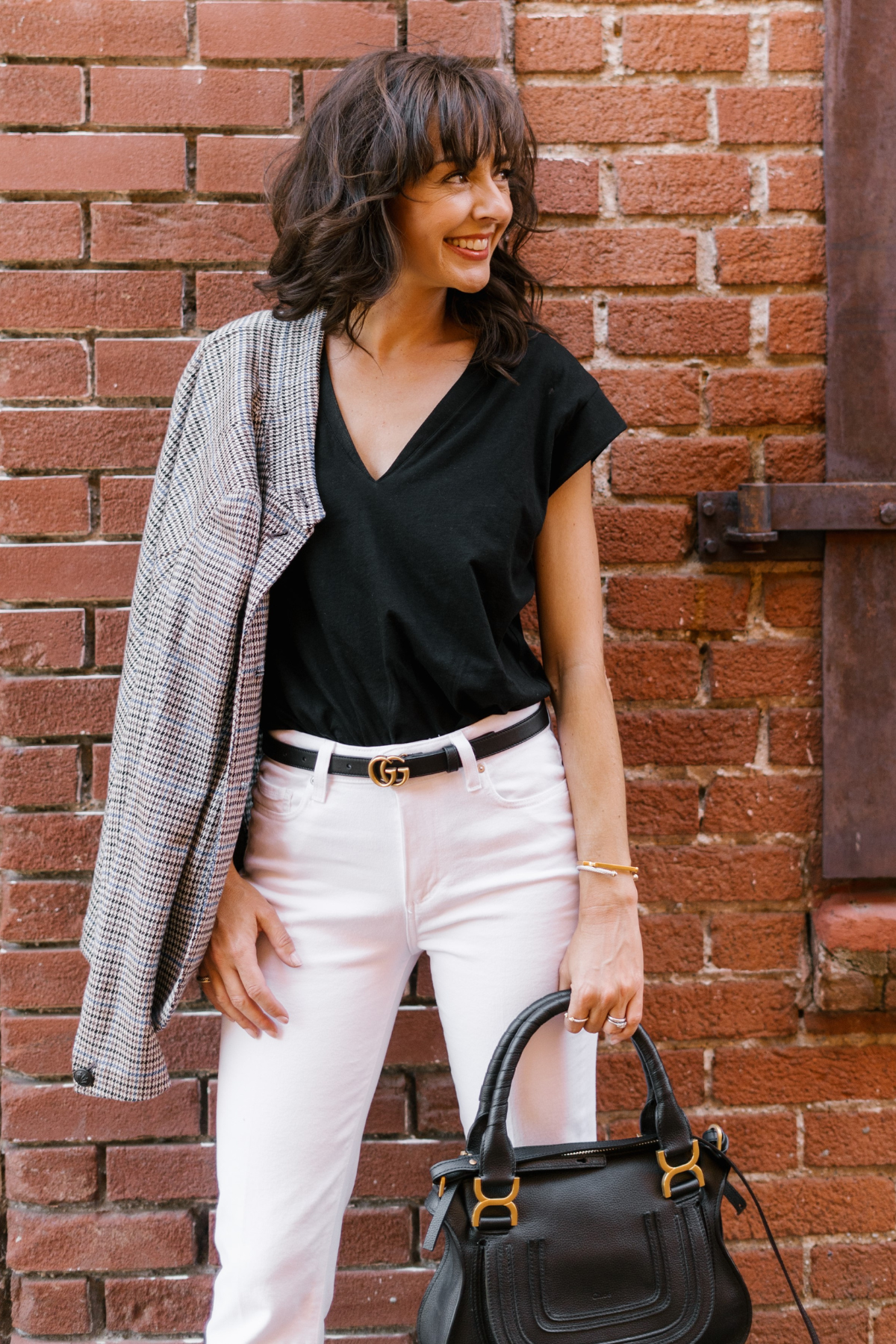 Jennifer Sattler; Pictured: Frame Black T-shirt