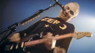 Billy Corgan, of the American alternative rock band The Smashing Pumpkins, performs on stage during a concert circa March, 1997 in Chicago, Illinois.