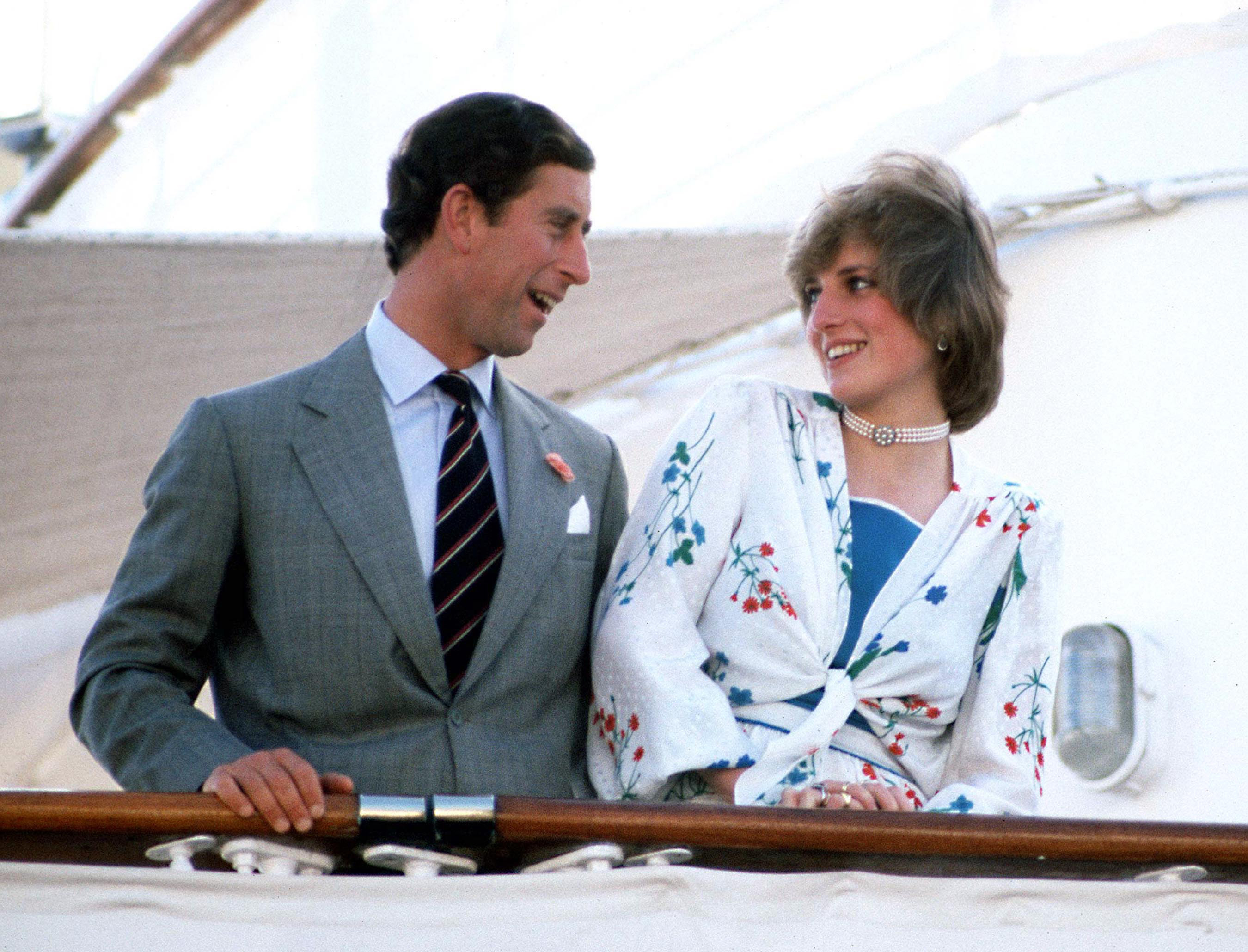 THE PRINCE AND PRINCESS OF WALES SEEN DEPARTING ON THEIR HONEYMMON CRUSIE ABOARD THE ROYAL YACHT BRITANNIA. GIBRALTER. THE PRINCESS WEARS A DONALD CAMPBELL DRESS. 31/7/1981 PHOTO BY JAYNE FINCHER
