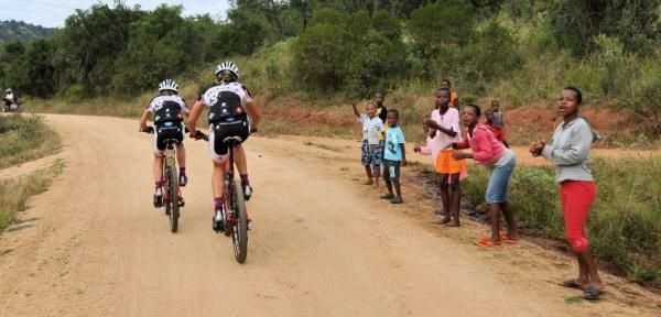 Riders are cheered on by the locals