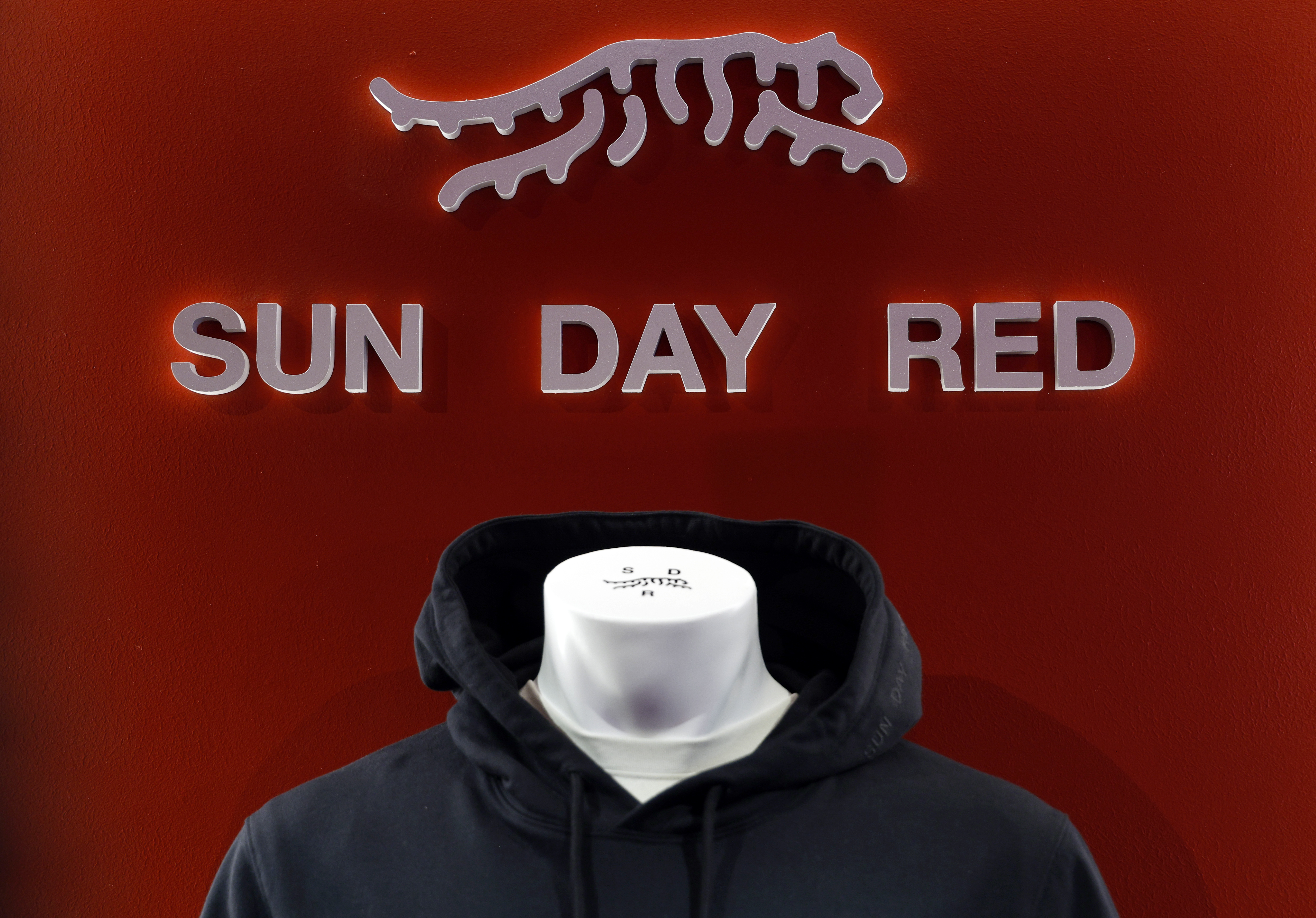 A Sun Day Red logo and hoodie