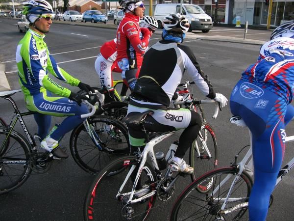 Daniele Bennati (Liquigas-Doimo), Luca Paolini (Aqua &amp; Sapone), Filippo Pozzato (Katusha) and Giovanni Visconti (ISD) chat at a set of lights in Melbourne, Australia.