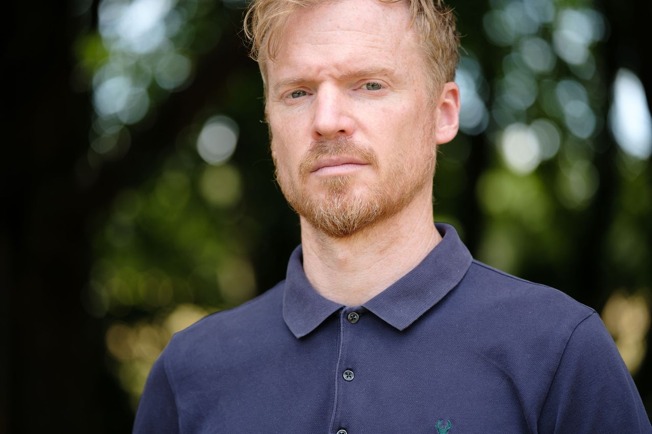 Viltrox AF 90mm F2.2 EVO and Fujifilm XF 90mm f/2 R LM WR lens comparisons: upper body portrait of a man with backlit trees