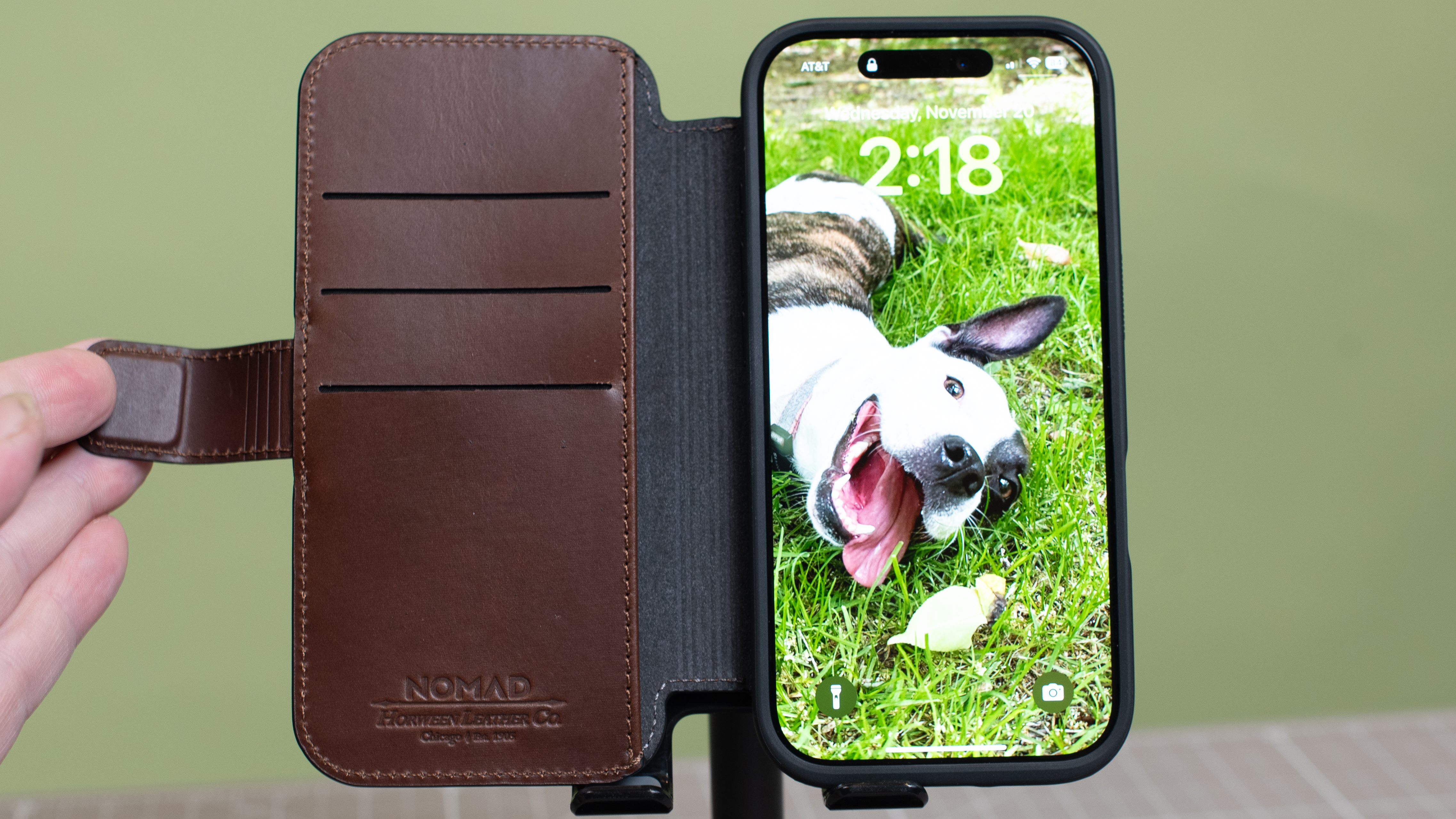 Nomad modern leather folio with iPhone 16 Pro in desert titanium inside showing multiple angles and buttons and camera cutout hole