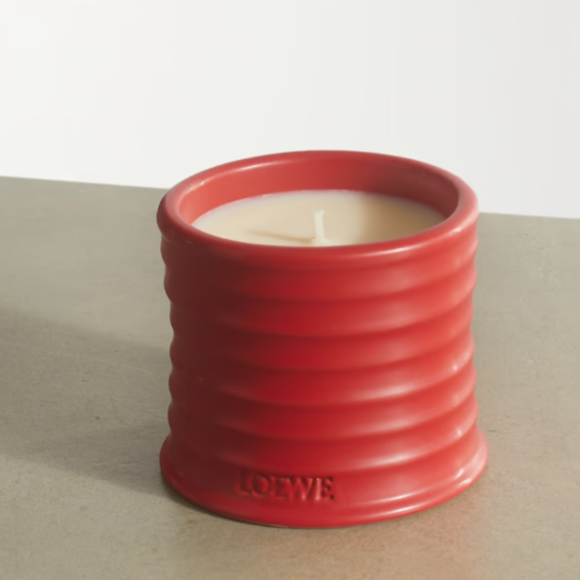 red candle product shot