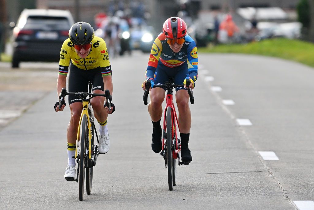 WAREGEM BELGIUM MARCH 27 LR Marianne Vos of The Netherlands and Team VismaLease a Bike and Shirin van Anrooij of The Netherlands and Team Lidl Trek attack in the breakaway during the 12nd Dwars door Vlaanderen 2024 Womens Elite a 1299km one day race from Waregem to Waregem on March 27 2024 in Waregem Belgium Photo by Luc ClaessenGetty Images