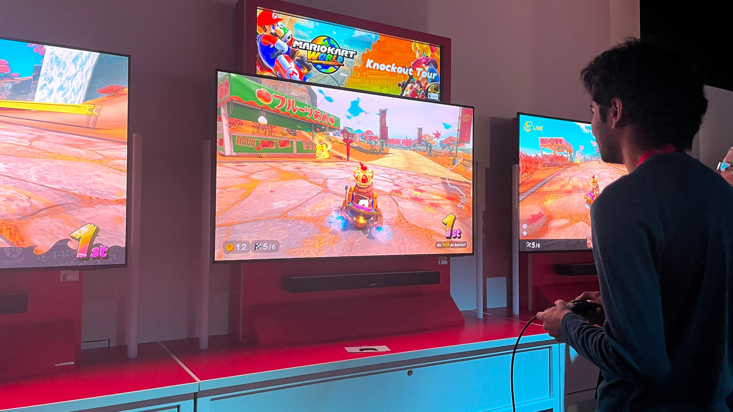 A Nintendo fan playing a demo of Mario Kart World at the Switch 2 NYC preview event on April 4, 2025