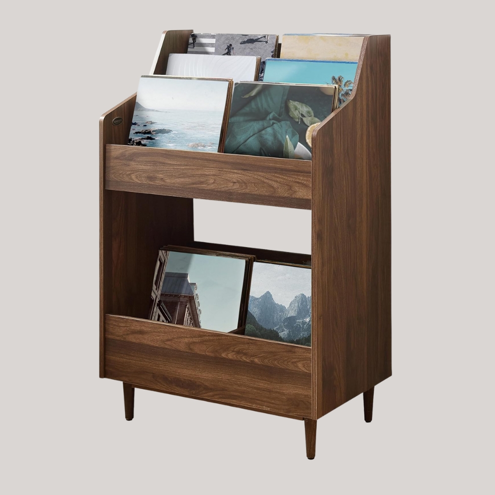 Crosley Furniture Liam Record Storage Stand in Walnut against pale grey background, filled with colorful records.
