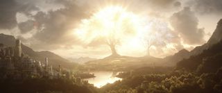 An image from episode one of The Lord of the Rings: The Rings of Power showing the Two Trees of Valinor