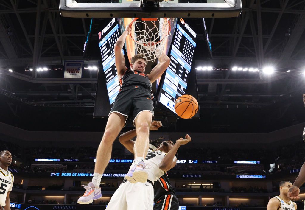 Caden Pierce #12 of the Princeton Tigers dunks during the second half against the Missouri Tigers in the second round of the NCAA Men&#039;s Basketball Tournament at Golden 1 Center on March 18, 2023 in Sacramento, California.