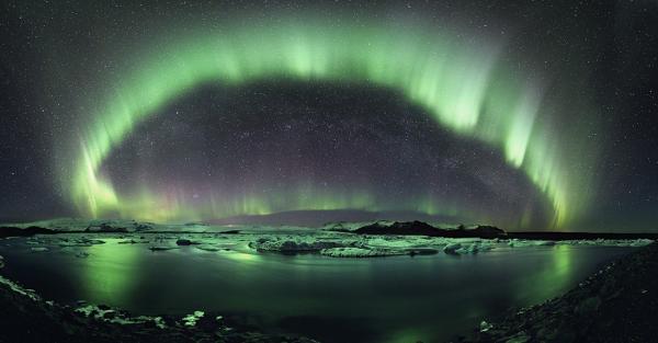 &#039;A Starry Night in Iceland&#039; by Stephane Vetter (http://www.nuitsacrees.fr/). First prize in the Beauty of the Night Sky category. An aurora dances over Iceland.