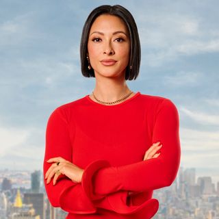 Jordan Taylor Braff crosses her arms in a red sweater in a promo shot of Selling the City S1.