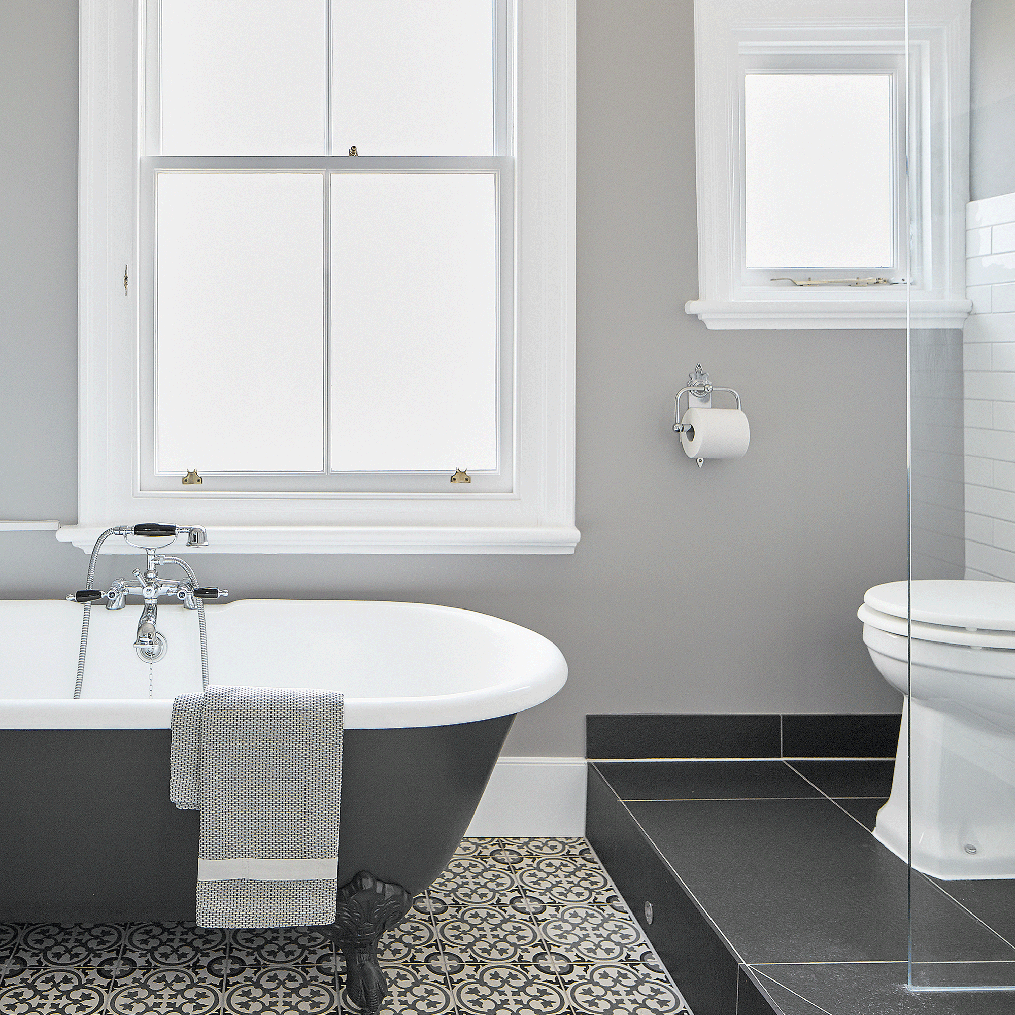 Grey bathroom with tiled floor