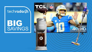 A TCL TV, Keurig coffee maker and Dyson vacuum on a blue background