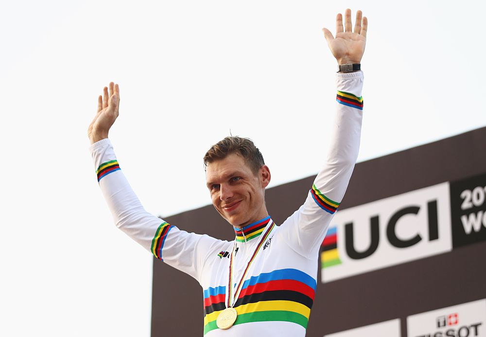 Tony Martin (Germany) celebrates his time trial world title on the podium in Doha