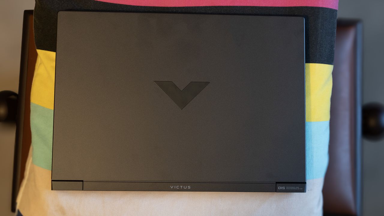 An HP Victus 15 laptop on a colourful table