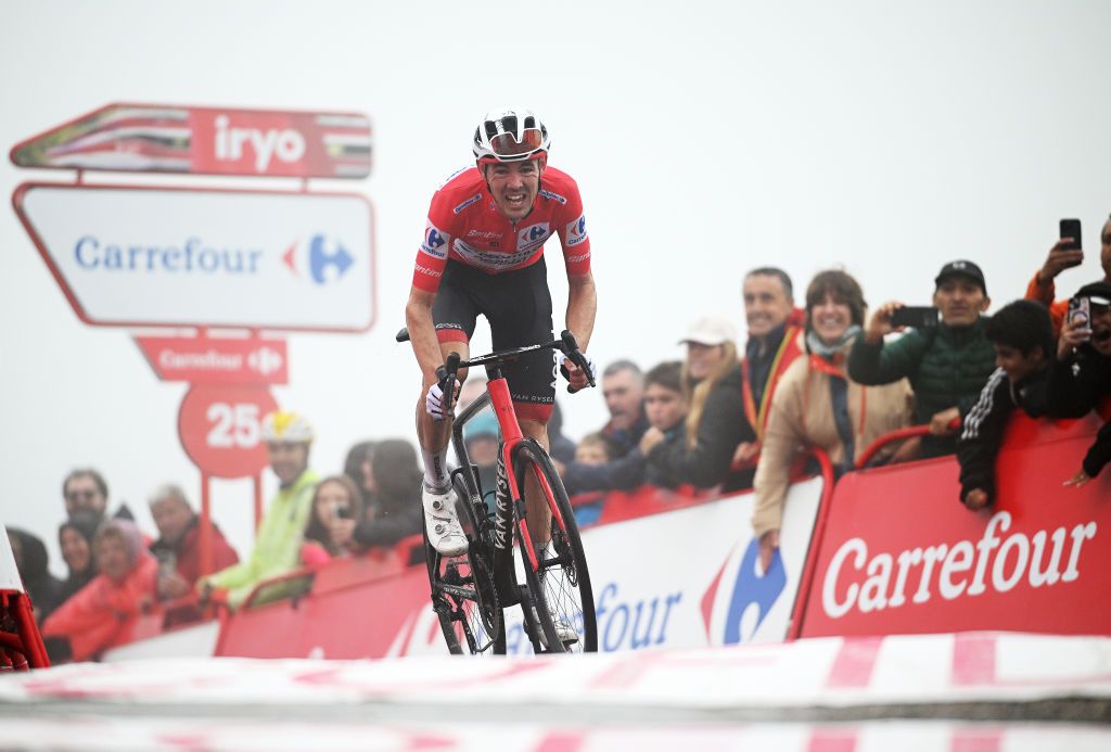 LAGOS DE COVADONGA SPAIN SEPTEMBER 03 Ben OConnor of Australia and Team Decathlon AG2R La Mondiale Red Leader Jersey crosses the finish line during the La Vuelta 79th Tour of Spain 2024 Stage 16 a 1815km stage Luanco to Lagos de Covadonga 1069m UCIWT on September 03 2024 in Lagos de Covadonga Spain Photo by Dario BelingheriGetty Images