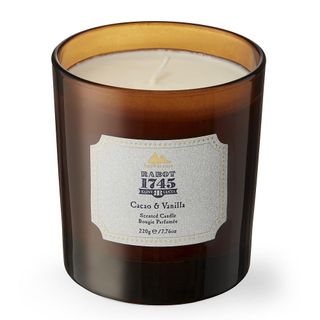 cacao and vanilla candle in brown colour glass