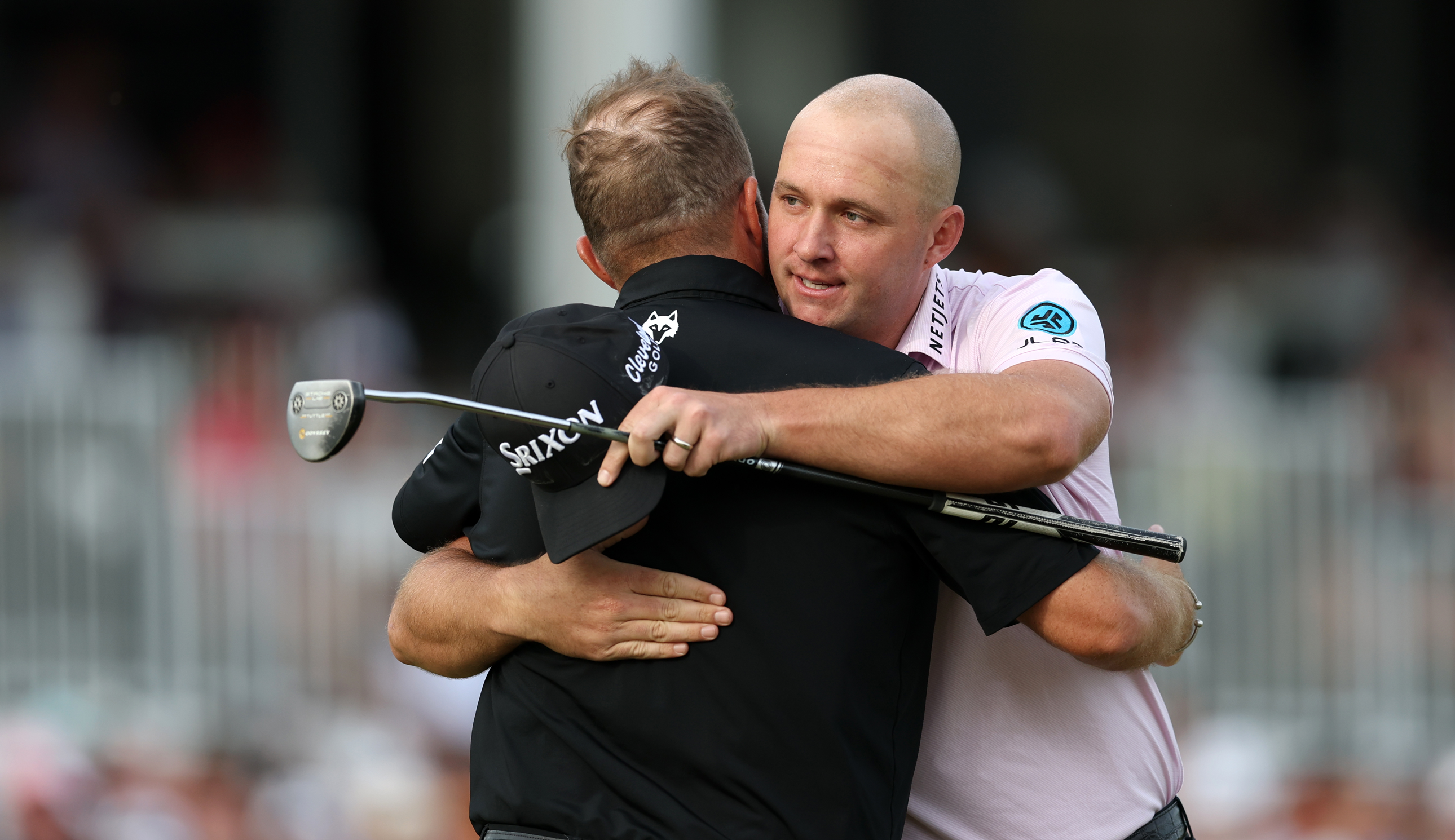 Sepp Straka hugs Shane Lowry