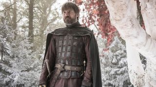 Nikolaj Coster-Waldau as Jaime Lannister in Game of Thrones standing in the snow.
