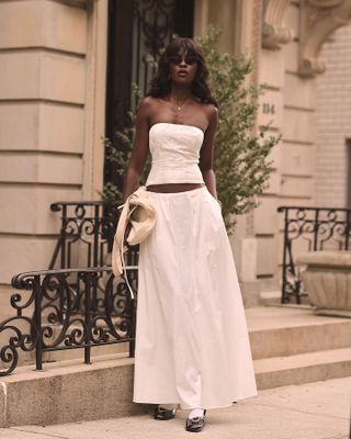 @lefevrediary wearing a white maxi poplin skirt