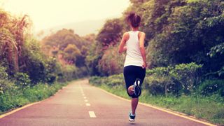 a photo of a woman running outside