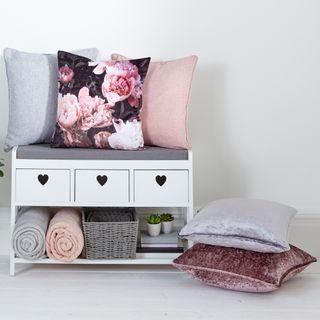 three drawer heart unit and white wall