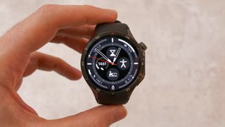 A photo of the OnePlus Watch 3 and OHealth app for Android