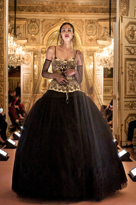 a model at the Dolce & Gabbana Alta Moda show wearing a tulle skirt dress