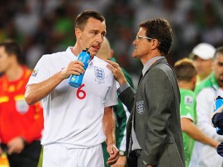 England manager Fabio Capello (left) speaks to John Terry