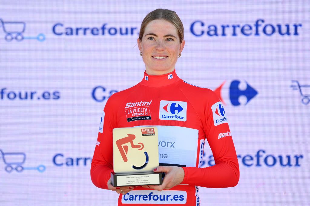 SIGUENZA SPAIN MAY 04 Demi Vollering of The Netherlands and Team SD Worx Protime celebrates at podium as Red Leader Jersey winner during the 10th La Vuelta Femenina 2024 Stage 7 a 1386km stage from San Esteban de Gormaz to Siguenza 1030m UCIWT on May 04 2024 in Siguenza Spain Photo by Alex BroadwayGetty Images