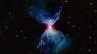 The protostar inside the nebula L1527 as imaged by the James Webb Space Telescope's Mid-Infrared Instrument (MIRI).