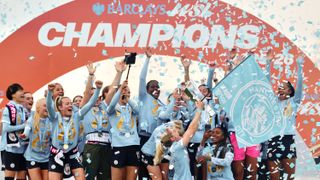 Manchester City celebrate lifting the trophy after the Barclays Women's Super League match against West Ham United at Chigwell Construction Stadium on May 16, 2026 in Dagenham, England