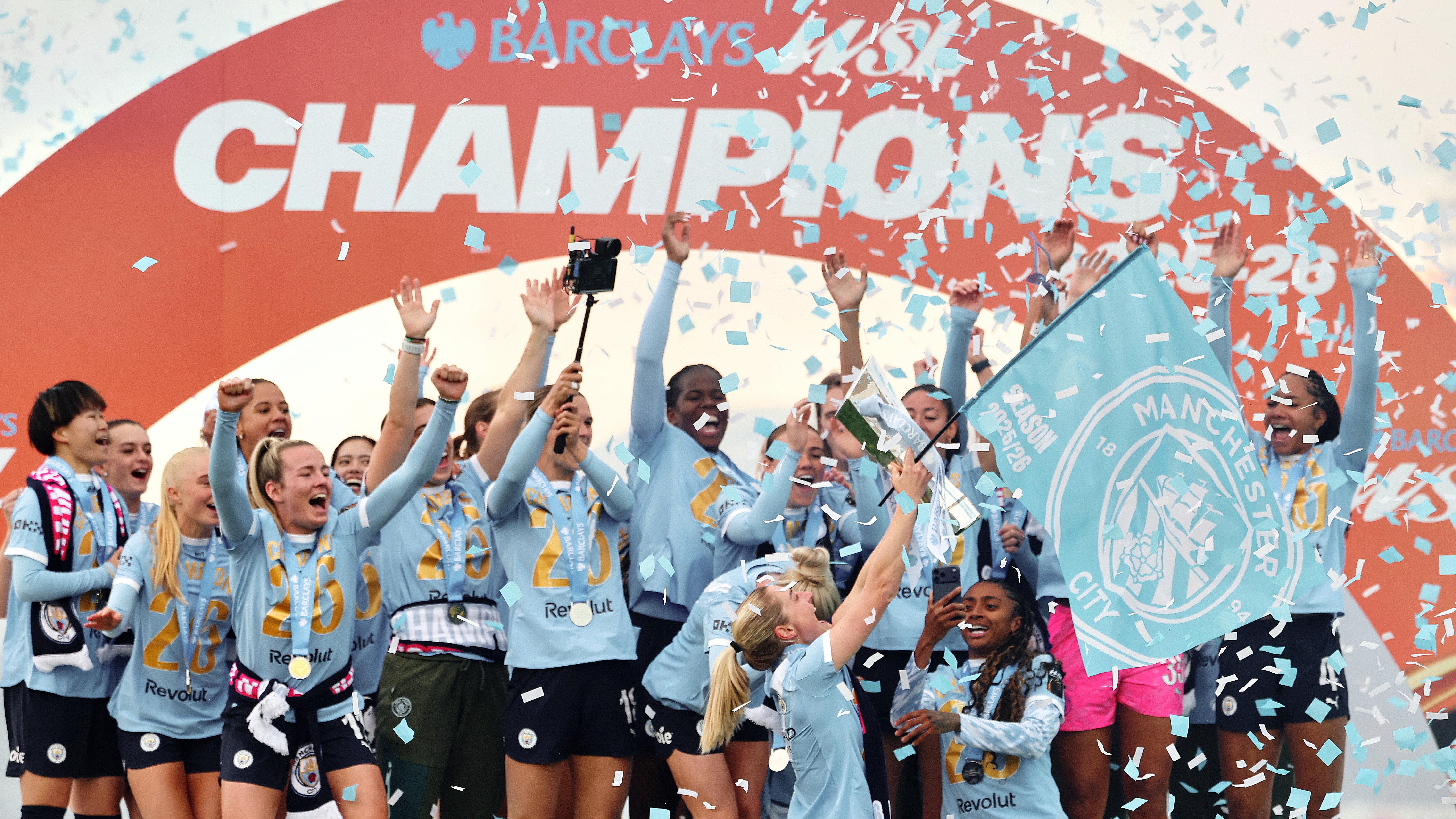 Manchester City celebrate lifting the trophy after the Barclays Women's Super League match against West Ham United at Chigwell Construction Stadium on May 16, 2026 in Dagenham, England