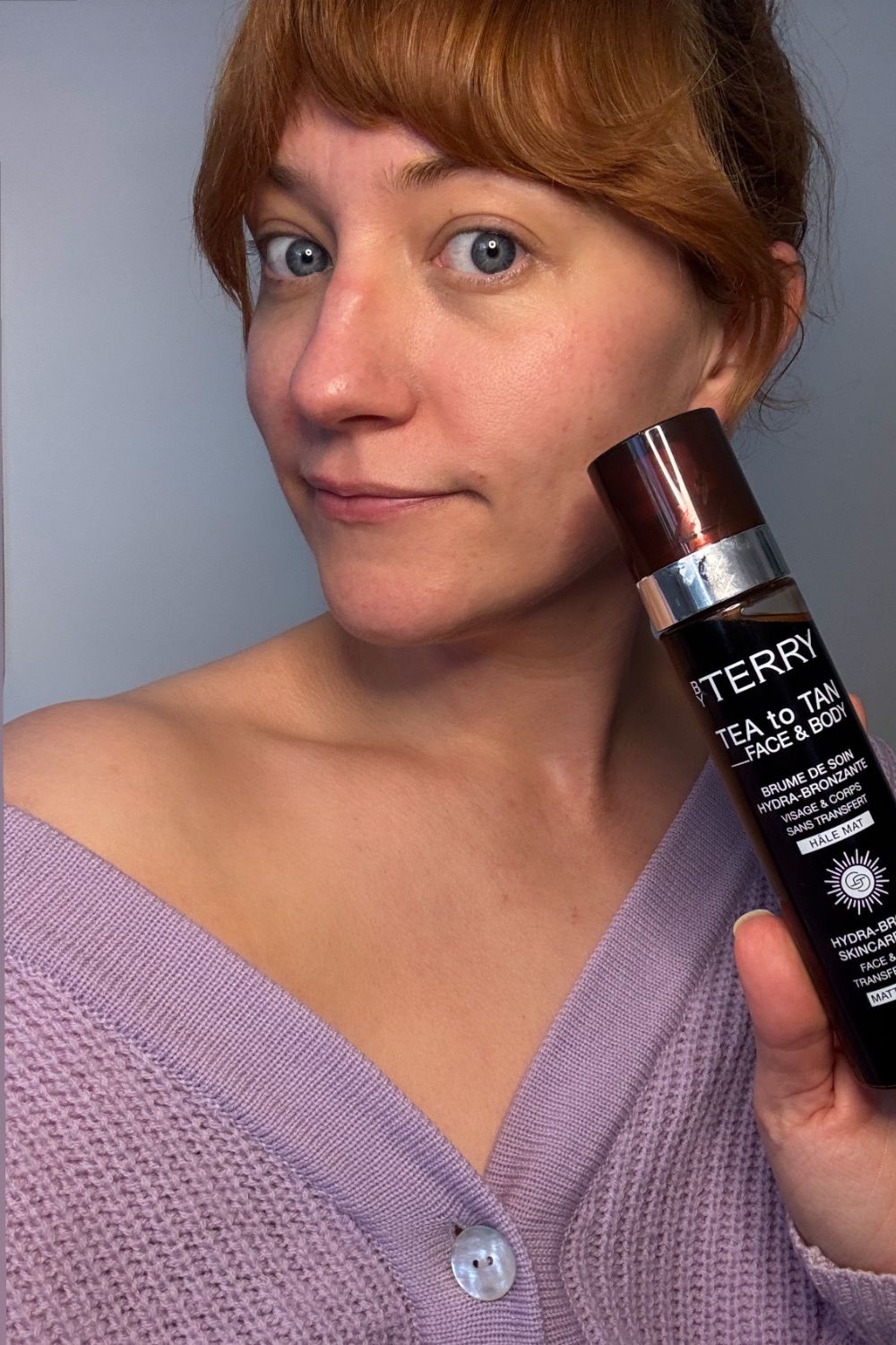 Matilda with bronzed skin after using by terry tea to tan face &body