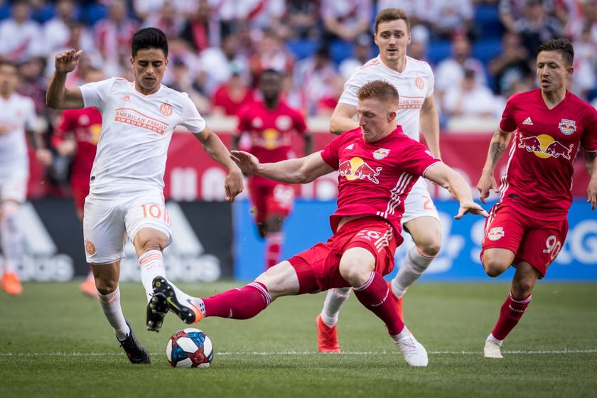 Tim Parker #26 of New York Red Bulls stops the advance by Gonzalo Martinez #10 of Atlanta United during the MLS match between Atlanta United FC and New York Red Bulls at Red Bull Arena on May 19 2019 in Harrison, NJ, USA. The New York Red Bulls won the match with a score of 1 to 0.