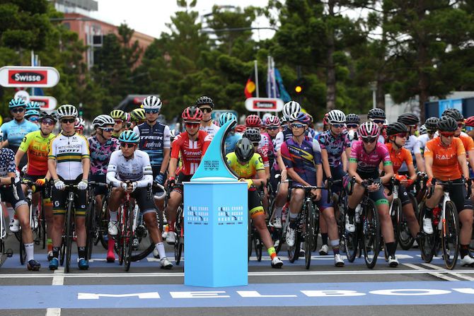 The riders eye the prize they&rsquo;re competing for ahead of the start of the race in Geelong