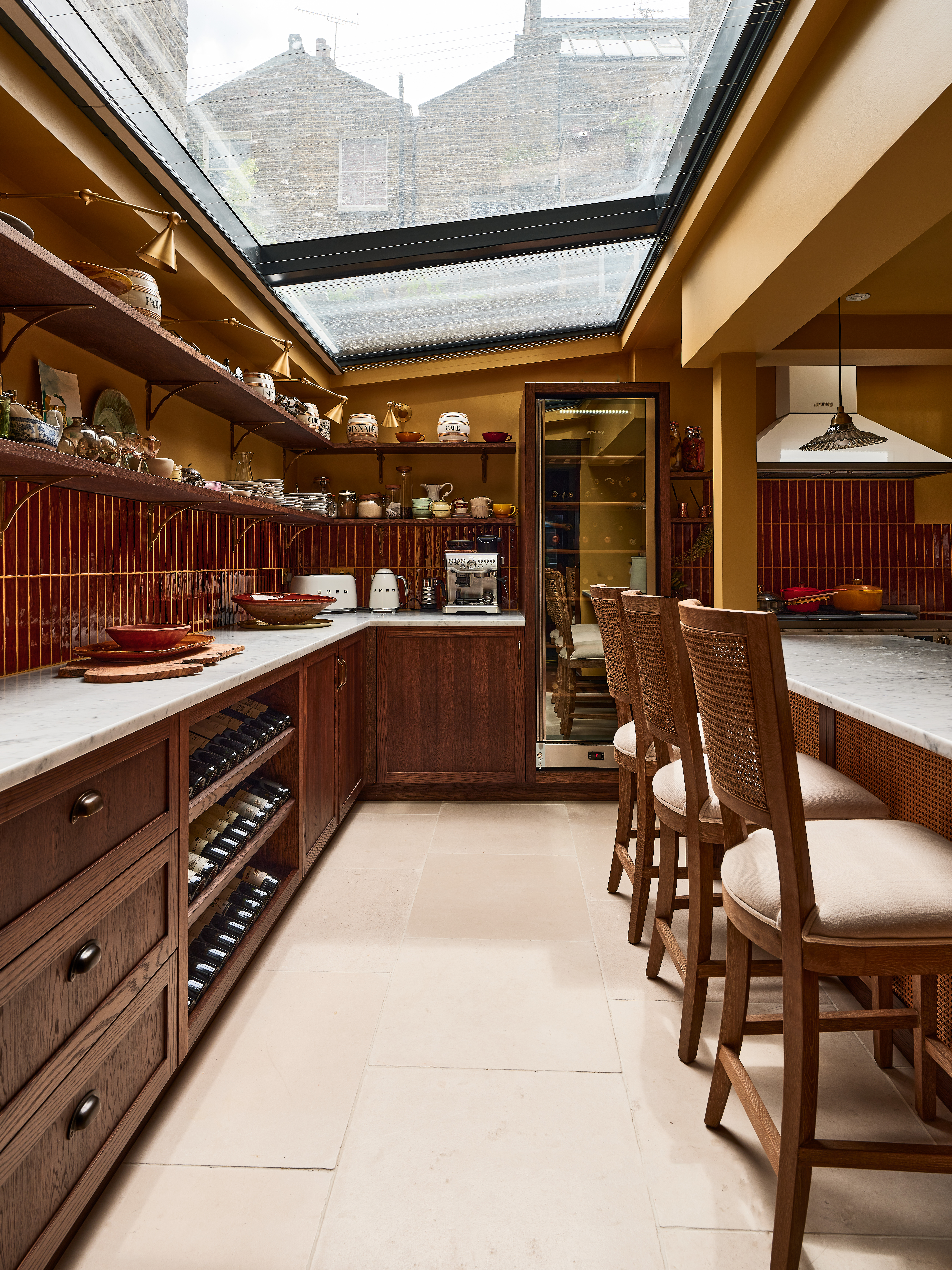 Kitchen with dark maroon tiles