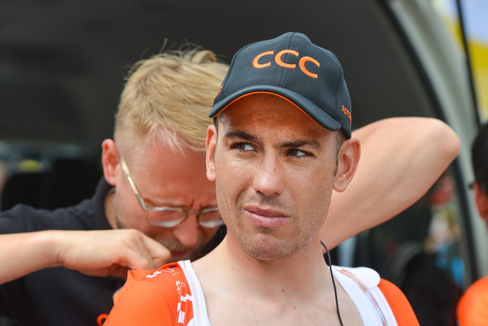 Patrick Bevin gets some work done after stage 4