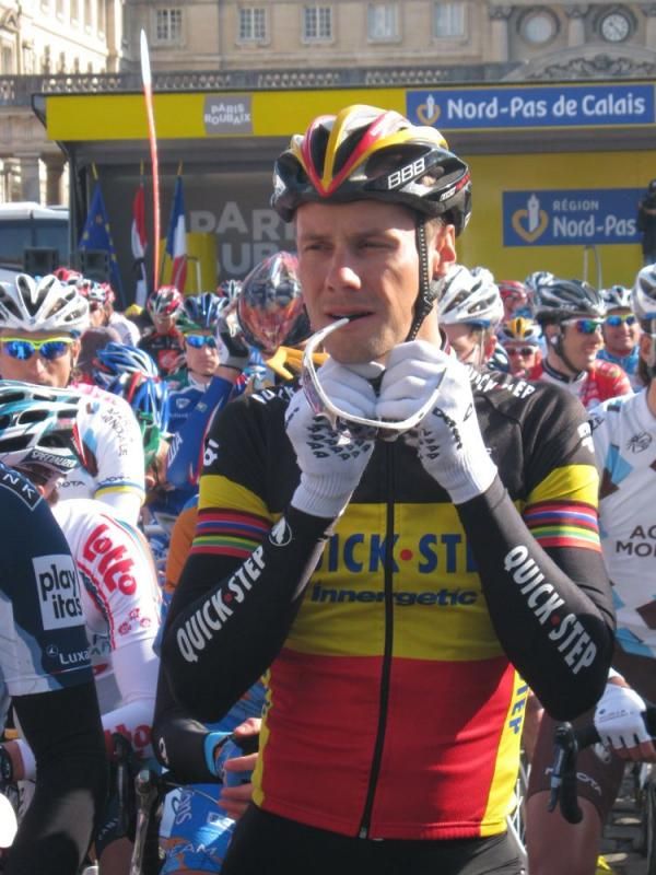 Boonen tightens his helmet before the start