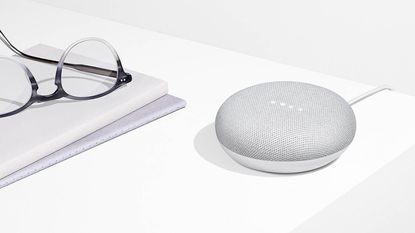 google home mini with smart assistant by John Lewis & Partners